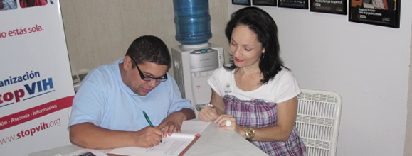 Firma de convenio Fundaceop - StopVIH